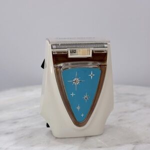 Lady Remington working vintage Retro Electric Shaver atomic snowflake design